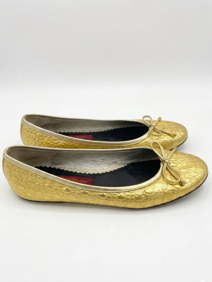 Gold metallic monogram print ballet flats