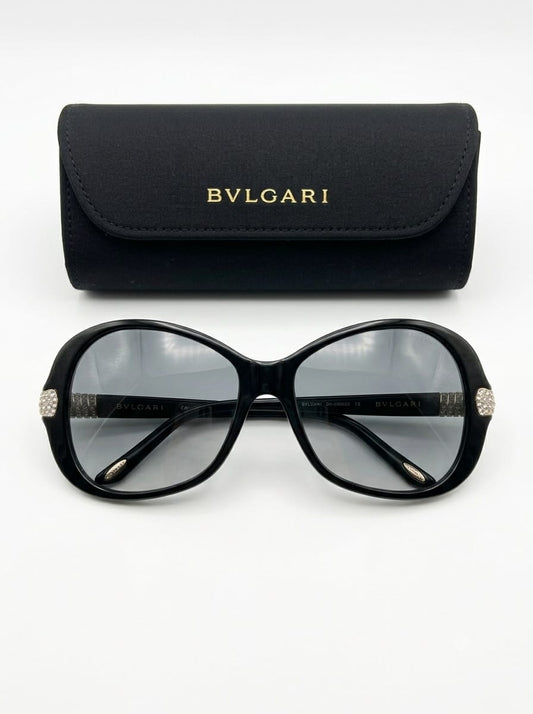 Black Sunglasses with grey shaded lenses