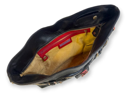 Rio black leather clutch with gold metal hardware