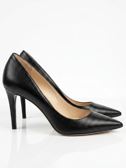 Black pointed-toe pumps