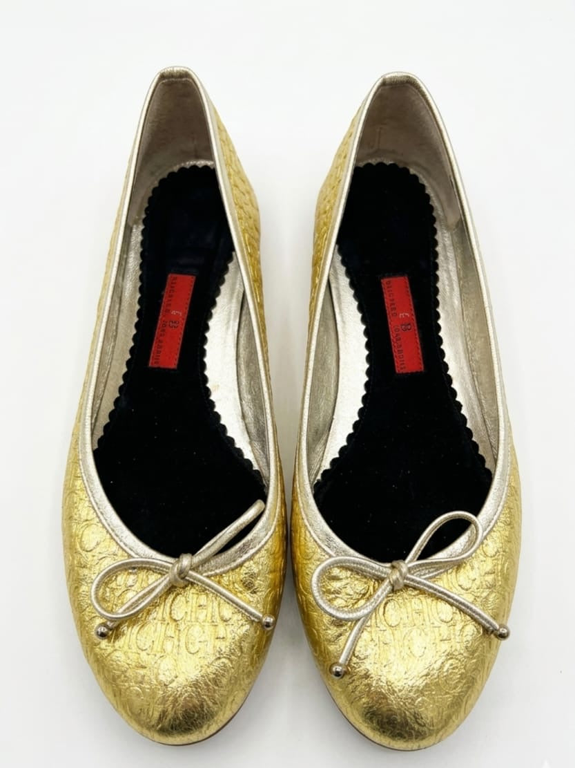 Gold metallic monogram print ballet flats