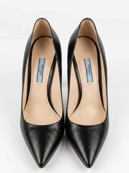 Black pointed-toe pumps